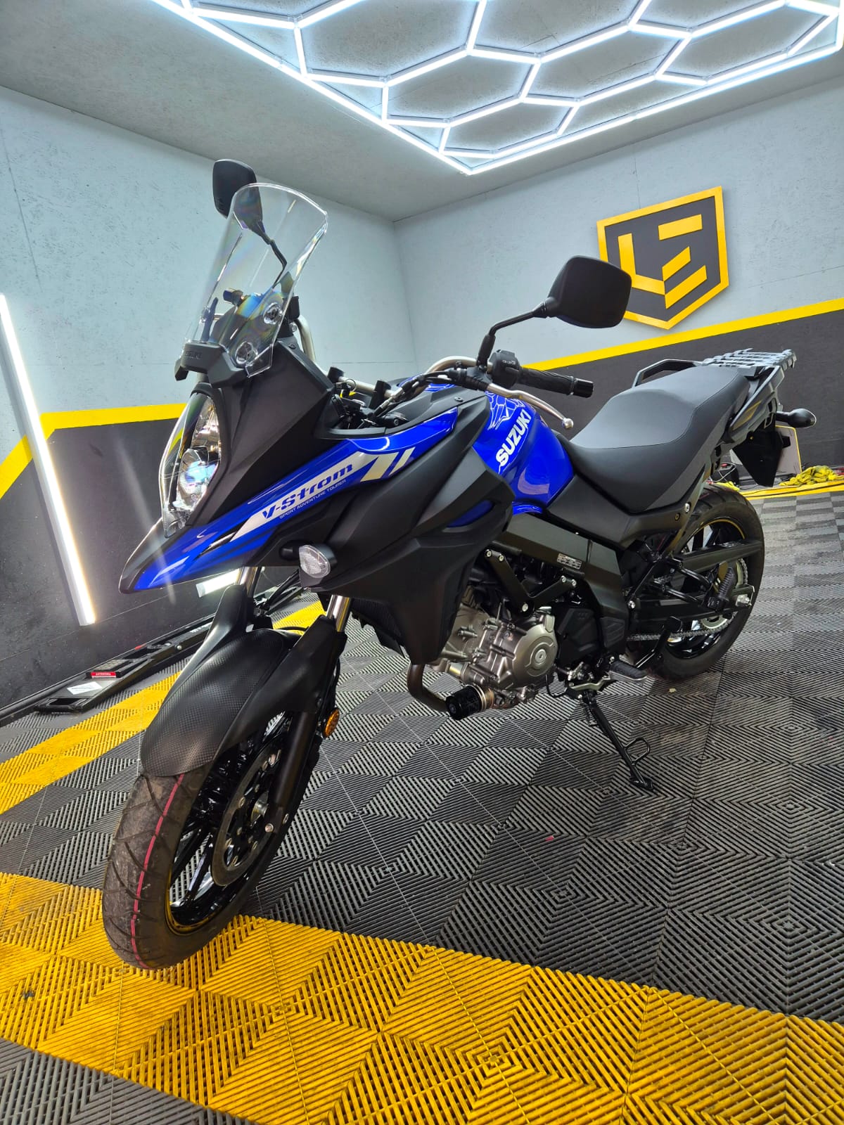 Suzuki V-Strom motorbike detailed in the L.E. Detailing studio